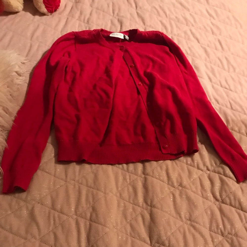 Got this light red sweater from Ross